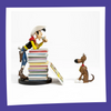 LUCKY LUKE - Lucky Luke & Rantamplan sur pile de BD - Figurine 25cm