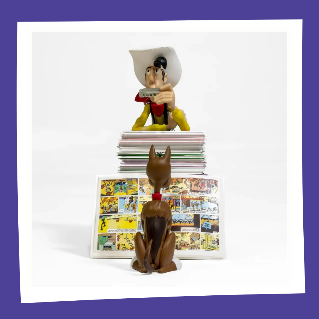 LUCKY LUKE - Lucky Luke & Rantamplan sur pile de BD - Figurine 25cm